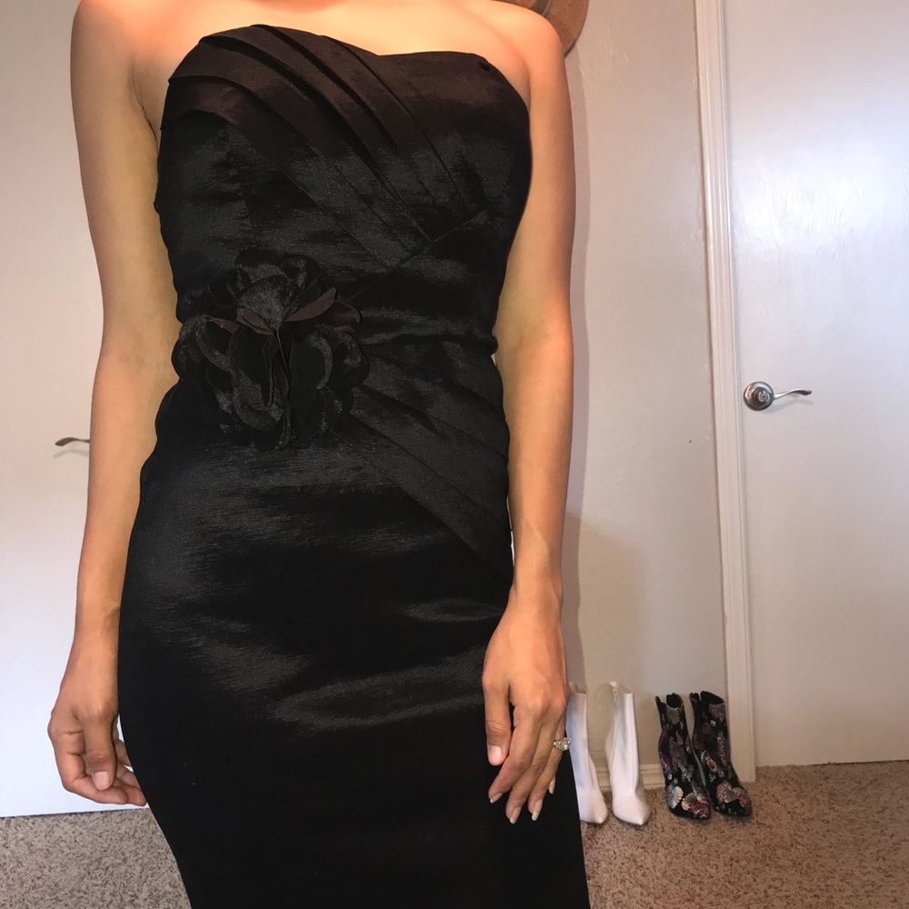 Flattering “all the right places” black dress